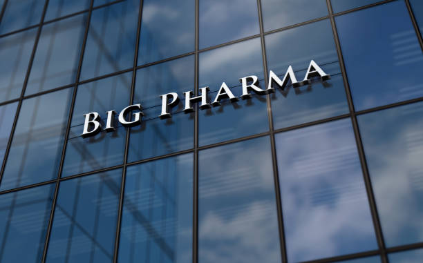 istock Big Pharma business glass building concept 1458016672
