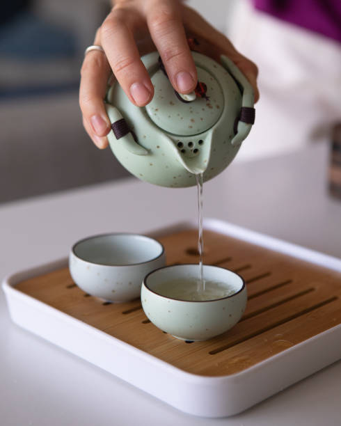 istock Asian tea set on bamboo mat,Closeup. 1458016835