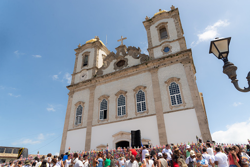 Salvador, Bahia, Brazil - January 06, 2023: Crowd of Catholics in front of Senhor do Bonfim church during mass. City of Salvador, Bahia.