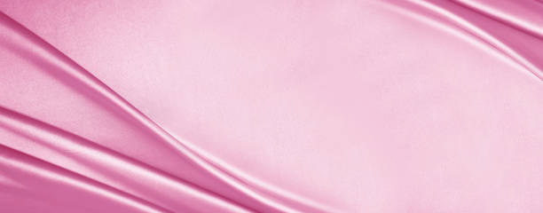 Light delicate pink silk satin fabric. Elegant background for design. Flat lay, table top view. Light delicate pink silk satin fabric. Elegant background with space for design. Flat lay, table top view. Banner. Wide. Long. Panoramic. Template. For babies. Or a wedding, Valentine's Day, romance. pink bed stock pictures, royalty-free photos & images