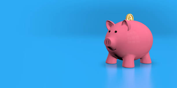 istock pink piggy bank with a gold coin going inside on a shiny blue surface. 3D Illustration 1458026933