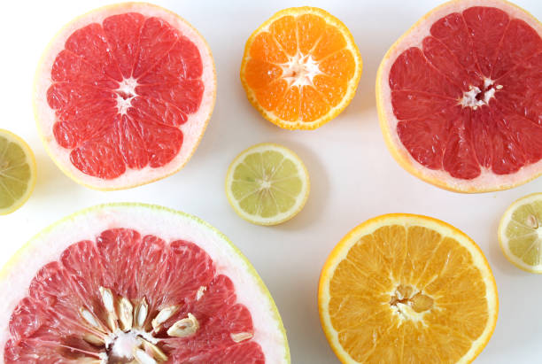 istock Background made with citrus slices (lemon, tangerine, orange, pomelo and, grapefruit). Citrus concept idea. 1458027193