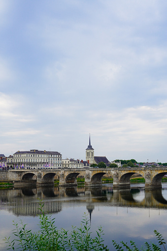Beautiful Cessart bridge of Saumur reflected on the Loire River, Loire valley,France