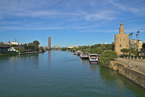 Torre del Oro and the river at daylight photographed from the bridge