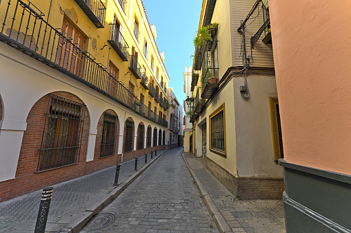 A random street in the city of Sevilla without pedestrians