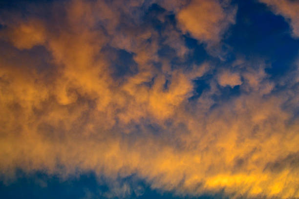 istock orange clouds in the sky highlighted by the sun 1458032964