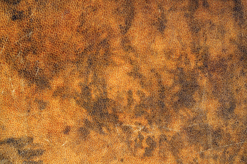 Mottled textured leather pattern some marks and scratches