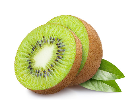 Whole and cut kiwi on a wooden brown table. Green fruits. Vitamin C. Fruits in the kitchen.