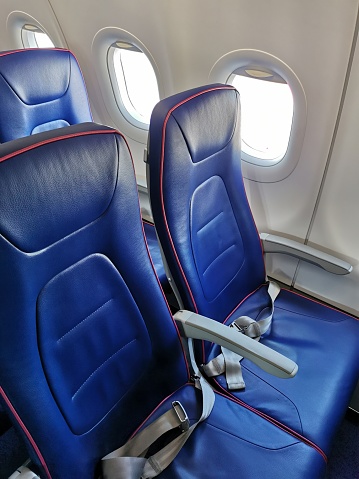 Empty blue airplane seats