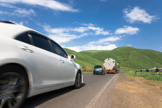 istock Cars drive on an asphalt road 1458046543