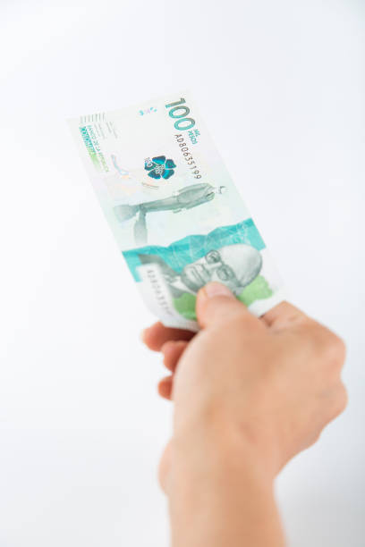 istock one hundred thousand colombian pesos bill 1458048474