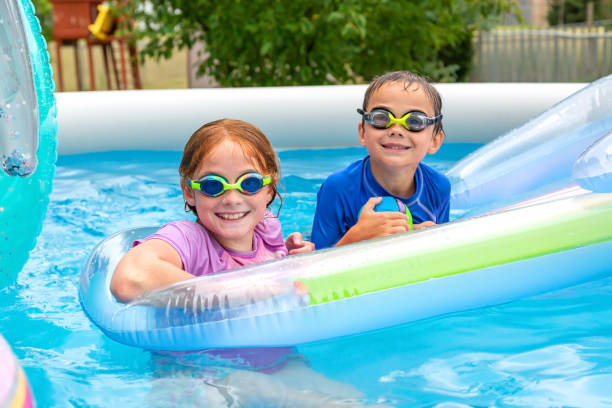 Free Stock Photo of Boy floating in pool with swim ring | Download Free ...