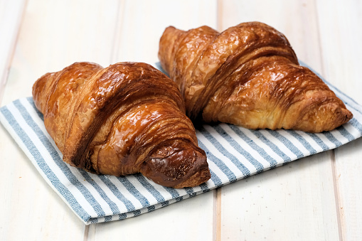 Close up for fresh baked croissants.