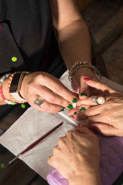 istock pedicure and manicure in beauty salon 1458053679
