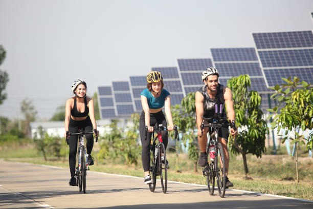 istock people ride the bike at park 1458056821