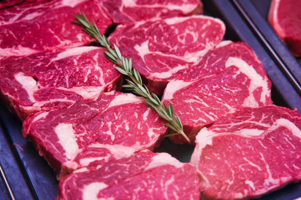 istock Pork escalopes with rosmary in a showcase 1458057032