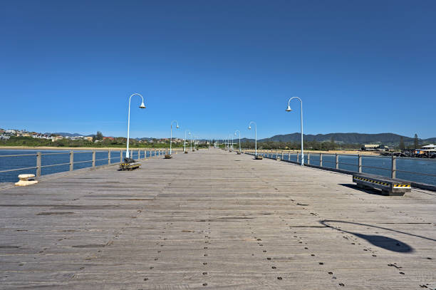 istock Coffs Harbour Jetty with view to the shore 1458058390