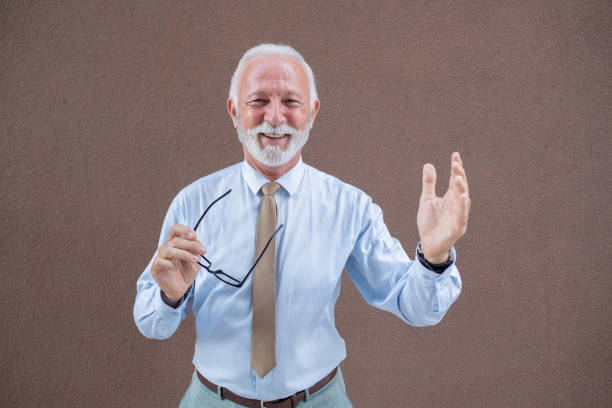 istock Senior businessman in a suit 1458065965