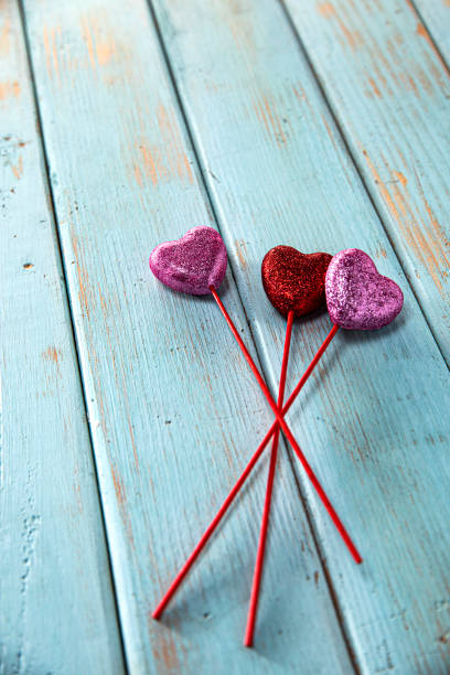 istock Valentines Day Decorations for a Party on Retro Wood Background 1458066719