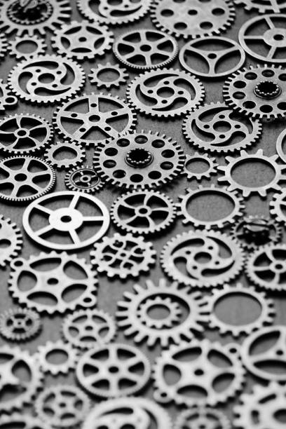 istock Black and white background with metal gears. 1458070083