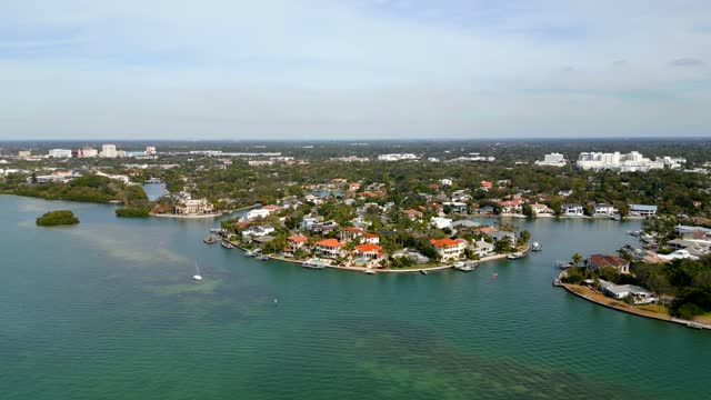 Aerial pull out shot luxury homes on Harbor Drive Sarasota Florida