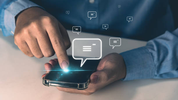 istock Person using finger typing sending text message and sms with smartphone. communication and icon concept. 1458076416