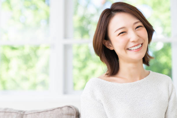 istock attractive asian woman relaxing 1458080701