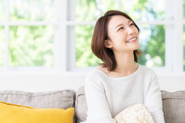 istock attractive asian woman relaxing 1458080863
