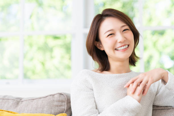 istock attractive asian woman relaxing 1458080892