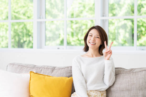 istock attractive asian woman relaxing 1458080905