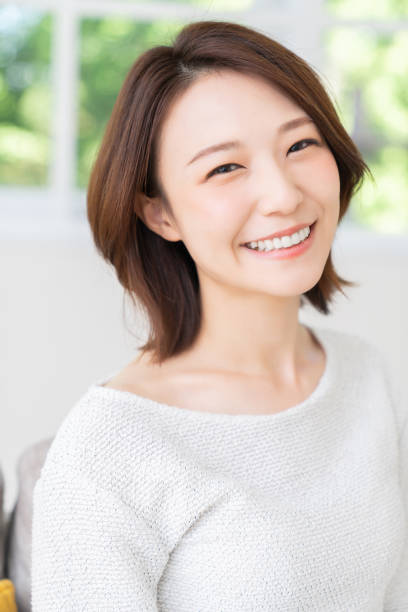 istock attractive asian woman relaxing 1458080915