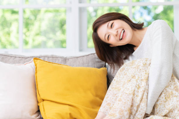 istock attractive asian woman relaxing 1458081084