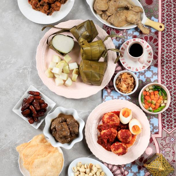 istock Ketupat Lebaran Set, Full Package Menu Served during Lebaran Eid 1458083622