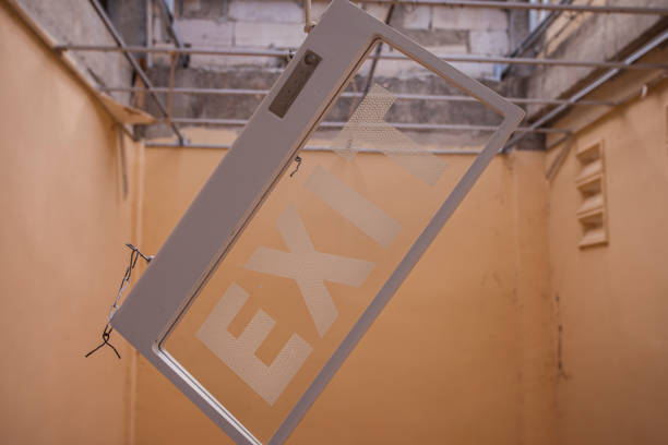 istock The hanging exit sign is almost out of place in a flat 1458083947