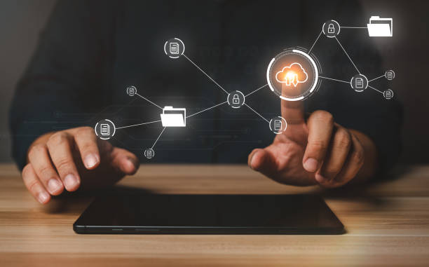 istock Businessman working on virtual screen of Document Management System (DMS). Software for archiving, searching, and managing corporate files and information, documentation in enterprise with ERP. 1458089922