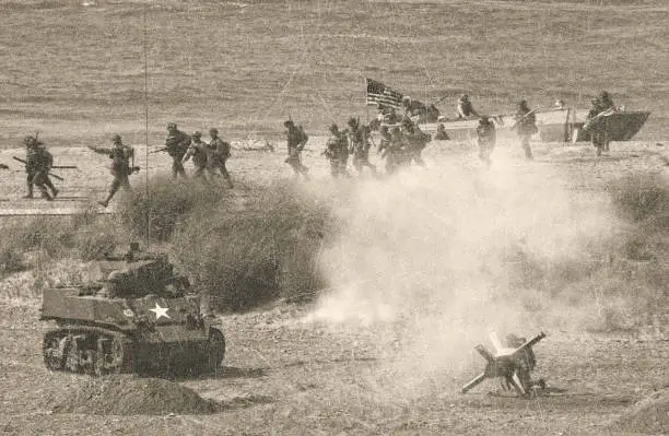 US soldiers invading Omaha Beach on D Day