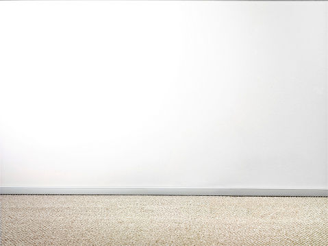 Empty room with white wall and carpet