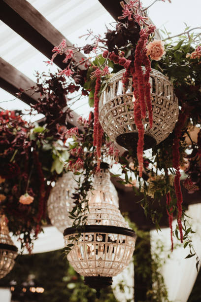 istock Elegant wedding reception with chandeliers and flowers 1458110933