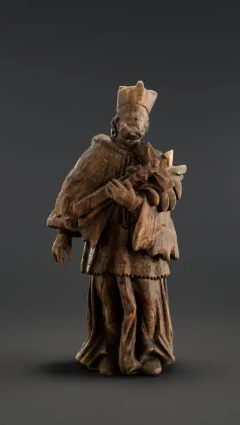 The figure of Saint John of Nepomuk. The saint is dressed in a cassock. 3d Rendering, single object