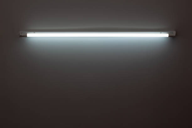 istock White neon lamp on a white wall 1458115203