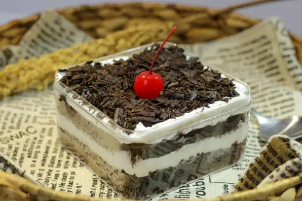 dessert box. delicious blackforest cake in transparent box. food concept.