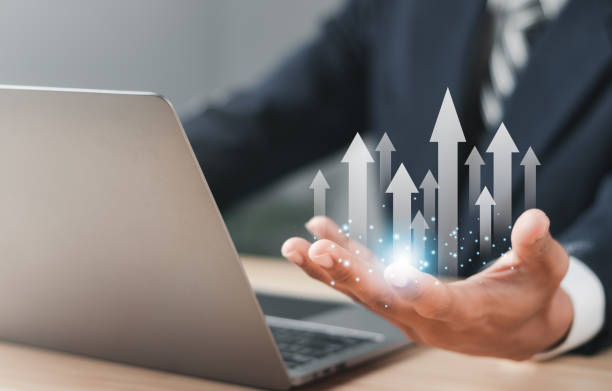 istock Businessman working with modern laptop computer. Planning and analyzing business and financial growth. Business incremental growth concept. 1458121449