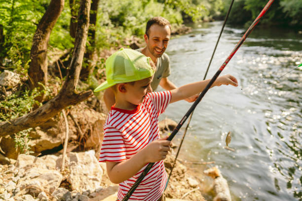 istock Father and son showing their 