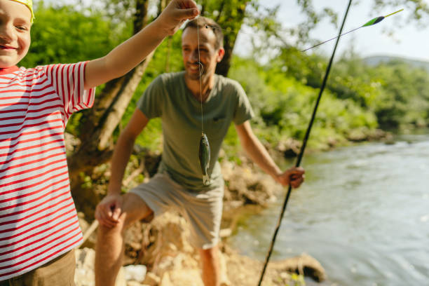 istock Father and son showing their 