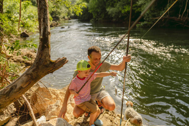 istock Father and son showing their 