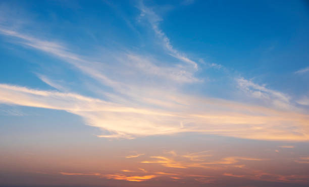 istock beautiful sunset, orange clouds, blue sky 1458135137