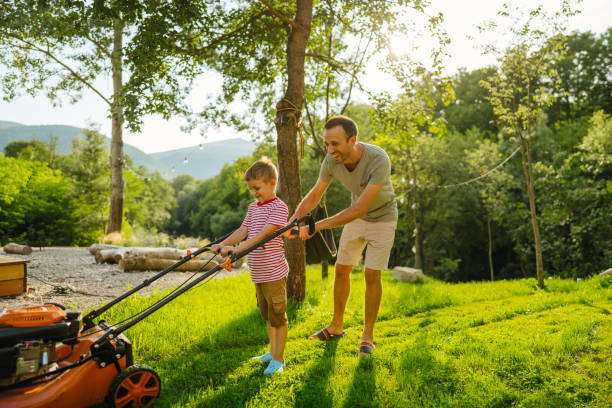 istock Mowing the lawn together 1458137514
