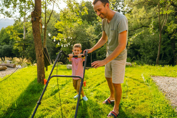istock Mowing the lawn together 1458137731