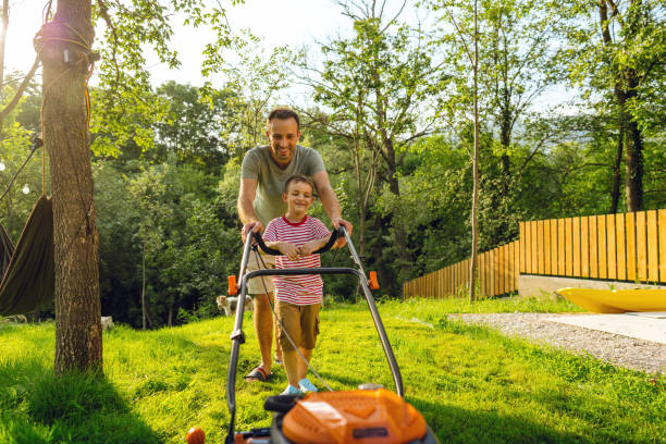 istock Mowing the lawn together 1458138650