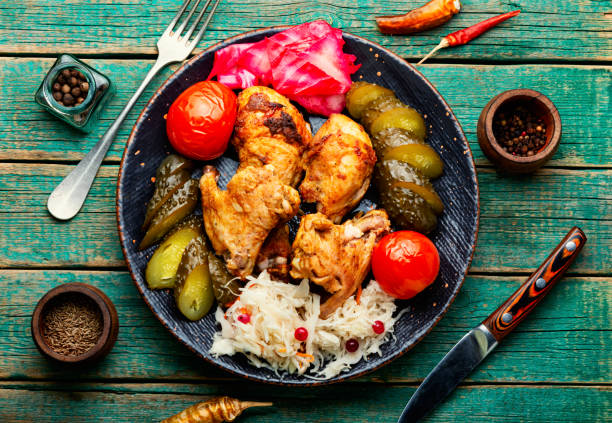 istock Roasted chicken meat and pickles vegetables 1458139533